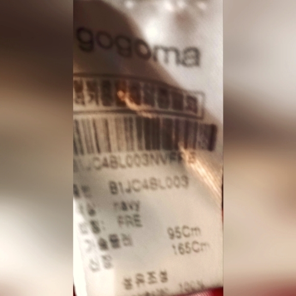 Long sleeved Navy flowered blouse with neck ruffle and small opening with a bow - Picture 5 of 5